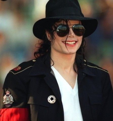 Michael Jackson/Souriant § Une chanson . 